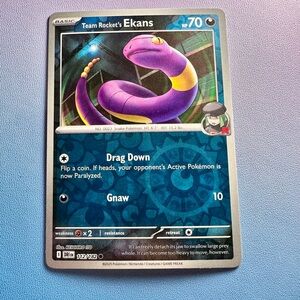 team rocket’s ekans [reverse holo] - 112/182 (common) — pokemon: destined rivals